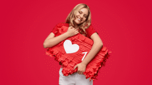 smiling creator hugging a giant Instagram like icon – symbol of follower growth