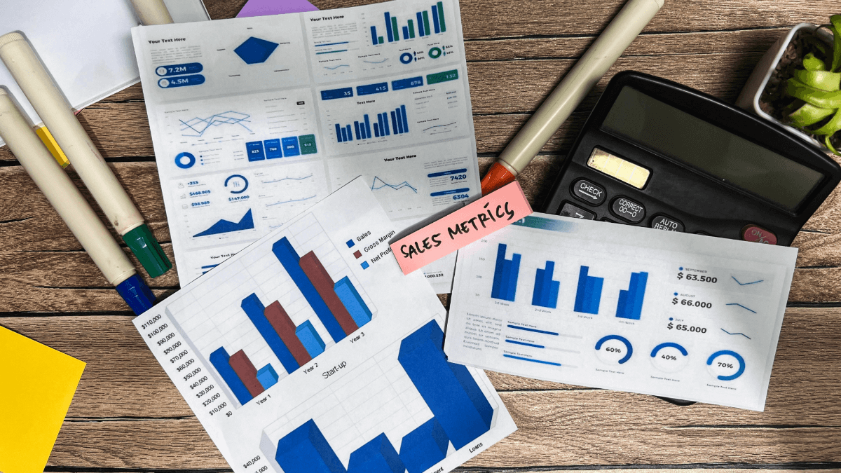 influencer research database checklist – printed engagement and sales metrics on desk
